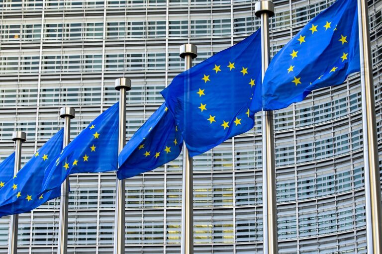 EU flags in front of European Commission in Brussels